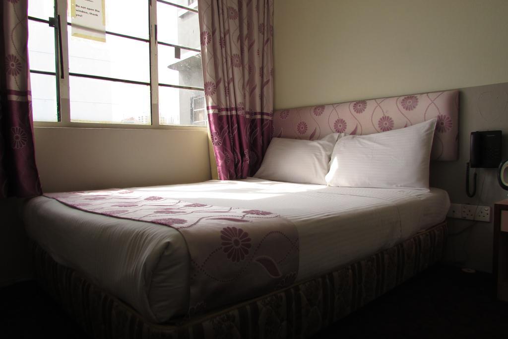 סינגפור Meriton Hotel חדר תמונה